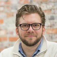 A photograph of Dr. Matt Beaudet smiling
